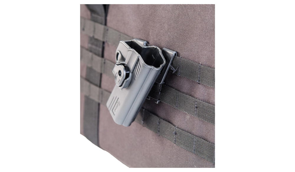 https://www.caldwellshooting.com/dw/image/v2/BCNX_PRD/on/demandware.static/-/Sites-caldwell-master/default/dwc7c2cfbb/images/110086/original/110086-w-holster-on-molle.jpg?sw=1000&sh=584